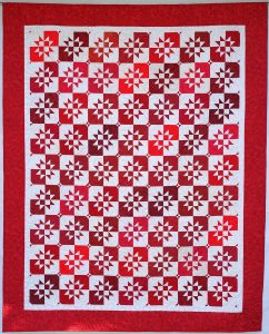 patchwork gilde austria quiltfest Helen Heaney Disappearing Hourglass in red and white